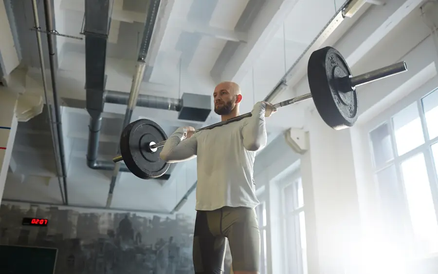Dor lombar na musculação: o que olhar antes de culpar o exercício